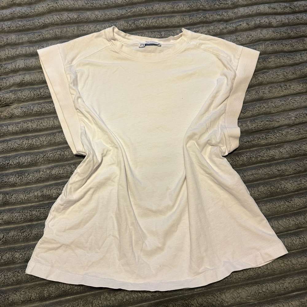 TWO Zara tee shirts. Black and white. Unique tops with ruffles and fun cut.